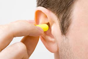 Man wearing hearing protection in Meriden, CT